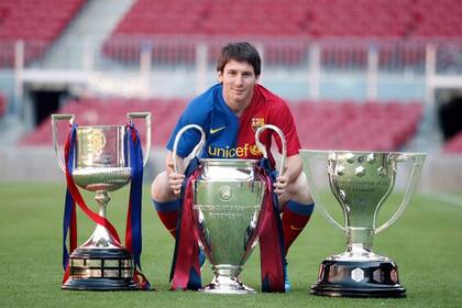 Messi, con la triple corona: la Copa de Rey, la Champions League y el trofeo de la Liga.