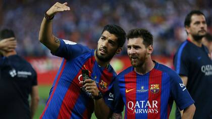 Messi junto a Suárez tras una nueva consagración