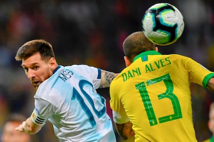 Messi y Dani Alves en el ultimo partido jugado en el Mineirao