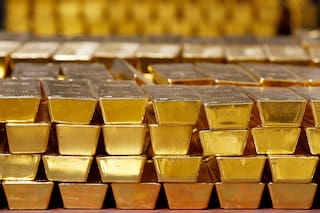 METALES PRECIOSOS-Oro se encamina a alza semanal por esperanzas de menores temores inflacionistas