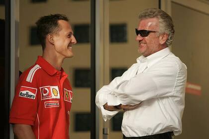 Michael Schumacher y su representante, Willi Weber