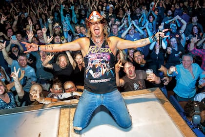 Michaels junto a fans de Poison en un show en el casino Mohegan Sun, en Connecticut