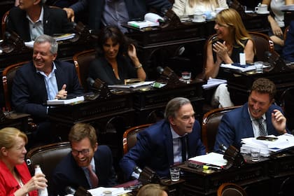 Miguel Pichetto y el diputado cordobés García Aresca, a su izquierda