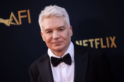 Mike Myers en la alfombra roja antes de "transformarse" en el ogro que lo unió profesionalmente a Murphy