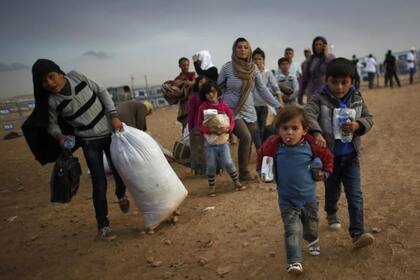 Miles de familias son desplazadas en Iraq y Siria, por temor a ser capturados por Estado Islámico
