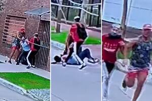 Momentos en que los asaltantes intentan quedarse con las pertenencias de la mujer