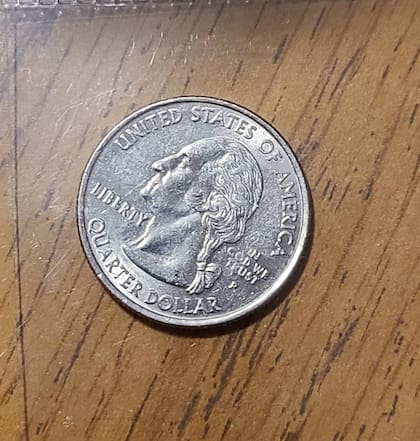 Moneda de un cuarto de dólar en plata