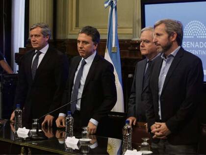 Monzó, Dujovne, Pinedo y Frigerio, en la presentación de ayer