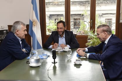Morales, Ferraro y Pichetto, durante la reunión