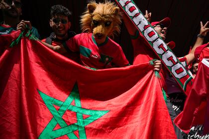 Moroccan supporters cheers up at the stand prior the World Cup group F soccer match between Morocco and Croatia, at the Al Bayt Stadium in Al Khor , Qatar, Wednesday, Nov. 23, 2022. (AP Photo/Thanassis Stavrakis)