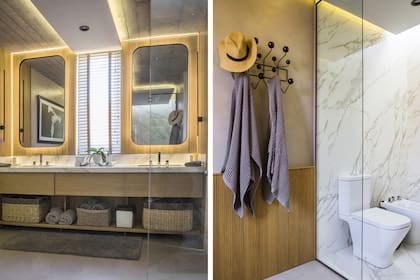 Mueble con doble bacha, espejos y accesorios en negro, diseñados por Urzi y hechos a medida. En las paredes y el piso, placas de Neolith.