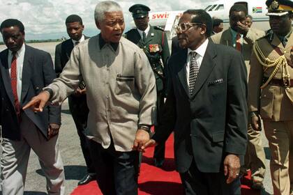 Mugabe y Nelson Mandela fueron líderes políticos contemporáneos