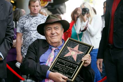 Aquí, con su estrella en el Hall de la Fama, en Hollywood, en 2013