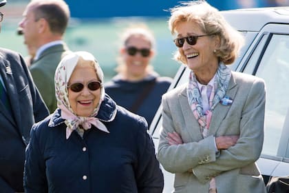 Muy sonrientes, Isabel II y Penelope –que mantenían una excelente
relación–, en el Royal Windsor Horse Show en Home Park,  en mayo de 2018. 