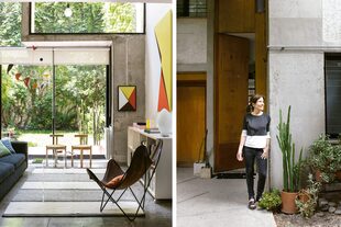 Natalia frente a su puerta, hecha de 3m de alto para entrar obras de gran formato.  El volumen de concreto y vidrio que avanza sobre el living y las diagonales identifican la arquitectura del edificio.
