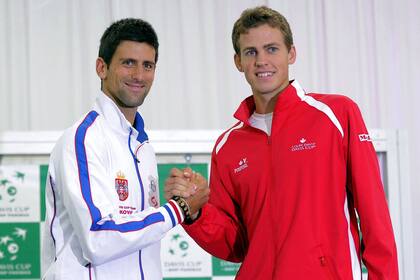 Novak Djokovic y Vasek Pospisil, durante un antiguo cruce en la Copa Davis: en 2019 ambos crearon el sindicato de la PTPA