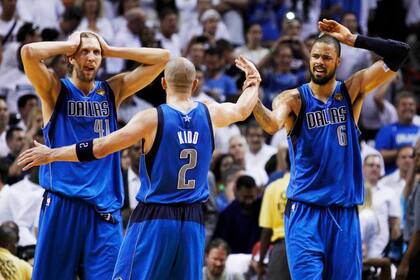 Nowitzki, Kidd y Chandler festejan el título obtenido en Miami
