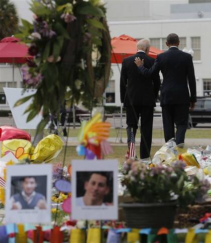 Obama y el vicepresidente Joe Biden, ayer, en Orlando