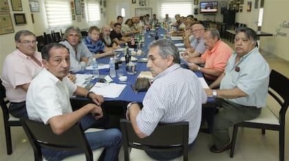 Omar Maturano y Juan Carlos Schmid, cuando estaban al frente de la Confederación del Transporte