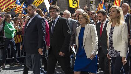 Oriol Junqueras, Carles Puigdemont y Carme Forcadell, tres figuras centrales de la alianza separatista catalana