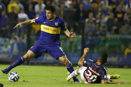 Ortigoza marca a Román en la Bombonera