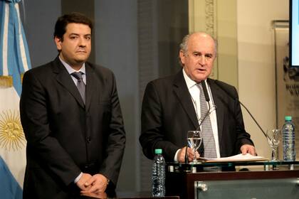 Juan Martín Mena y Oscar Parrilli, cuando integraban la cúpula de la AFI