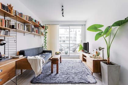 Otro acierto de este living, las cortinas con paneles.