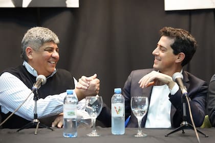 Pablo Moyano y Eduardo de Pedro, tras el anuncio oficial