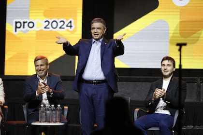 Panel de gobernadores en una convención de Pro en 2024: Rogelio Frigerio (Entre Ríos), Jorge Macri (Capital) e Ignacio Torres (Chubut)