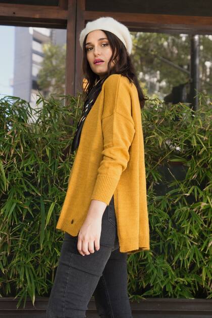 Pañuelo: VER Boina: Mercado Libre Sweater: VER