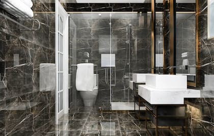 Para renovar un baño, se suele reemplazar la cerámica y los azulejos originales por pocelanato en pisos y paredes