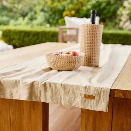 Para una mesa fresca, un camino es una gran opción.