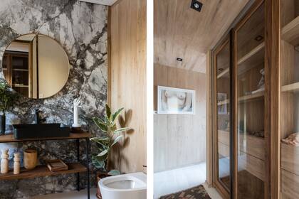 Pared en mármol ‘Invisible Gray’ (Canteras del Mundo). Bacha ‘County Baja’ (Ferrum). Sanitarios ‘Marina’ (Ferrum) contra la pared con revestimiento de enchapado de petiribí, el mismo que se usó al salir del vestidor (Talleres Sustentables).