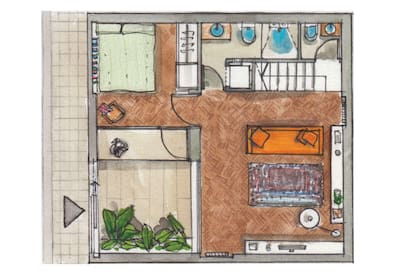 Patio de acceso, dormitorio y amplio living. En el bajo escalera: baño completo con lavarropas junto a la puerta; el línea, el toilette