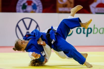 "Peque" en acción, en sus días de judoca: campeona olímpica y mundial, ejemplo de constancia que hoy disfrutan los chicos sub 18, sub 15 y sub 13 del programa de desarrollo del Enard