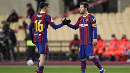 Pedri y Messi en el Barcelona