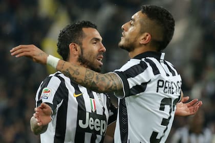 Pereyra y Tevez, compañeros en Juventus y en la selección