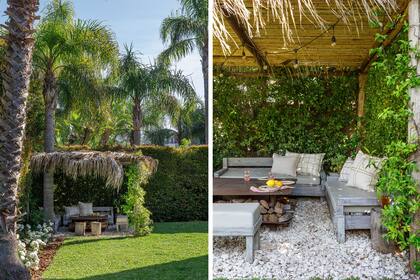 Pérgola de cañas y troncos de eucalipto con ramas secas de palmera armada por los dueños de casa. Fogonero (Bio Fogones Design). 