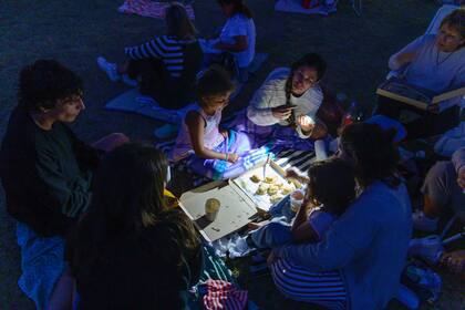Picnic bajo las estrellas en el golf de Pinamar.