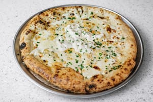 Pizza de cuatro quesos