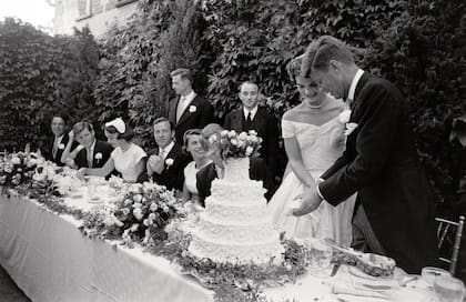 Please contact your Account Representative for licensing use on merchandise and/or resale products; fine art prints, wall décor, gallery, nonprofit or museum displays.
Mandatory Credit: Photo by Lisa Larsen/The LIFE Picture Collection/Shutterstock (11970217l)
Senator John Fitzgerald Kennedy and Jacqueline Kennedy cutting cake on their wedding day, United States, 12th September 1953.
John Fitzgerald Kennedy's Wedding, USA - 12 Sep 1953
