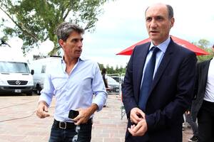 Prada y Scoltore, los representantes de Tinelli en el fallido anuncio ayer del nuevo Fútbol para Todos