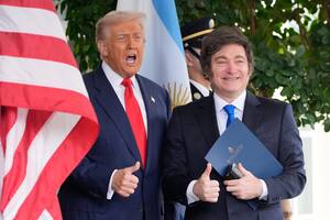 President Donald Trump greets Argentina's President Javier Milei at the White House, Tuesday, Oct. 14, 2025, in Washington. (AP Photo/Alex Brandon)