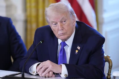 President Donald Trump listens during a meeting with oil executives in the East Room of the White House, Friday, Jan. 9, 2026, in Washington. (AP Photo/Alex Brandon)