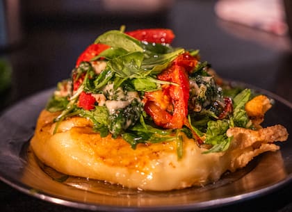 Provoleta con champis a la provenzal