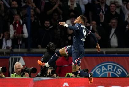 PSG's Neymar celebrates after scoring his side's opening goal during the League One soccer match between Paris Saint Germain and Marseille, at the Parc des Princes stadium, in Paris, France, Sunday, April 17, 2022. (AP Photo/Francois Mori)