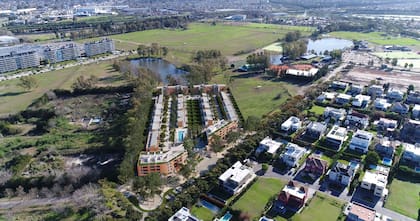 Pueblo Buenavista donde conviven viviendas, comercios y espacios verdes
