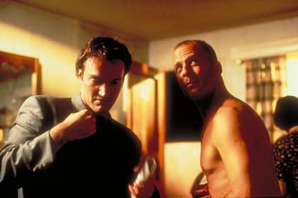 Quentin Tarantino junto a Bruce Willis. El actor entró casi por descarte al proyecto.