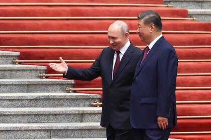 Putin y Xi Jinping en un momento distendido del encuentro entre ambos líderes