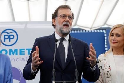 Rajoy, en un encuentro del PP, horas después de declarar ante la Justicia